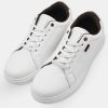 White Sneakers with Subtle Brown Details
