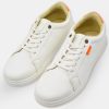 White Sneakers with Subtle Orange Details