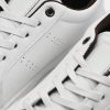 White Sneakers with Subtle Brown Details - Image 5
